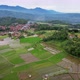 The landscape with the expanse of rice fields, settlements and hills - VideoHive Item for Sale