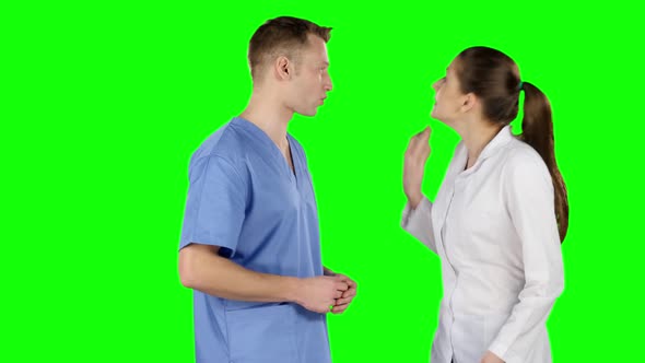 Dispute of Two Young Doctors. Green Screen alt