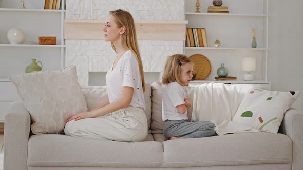 Family Quarrel Caucasian Angry Young Mother and Offended Little Preschool Girl Child Daughter alt