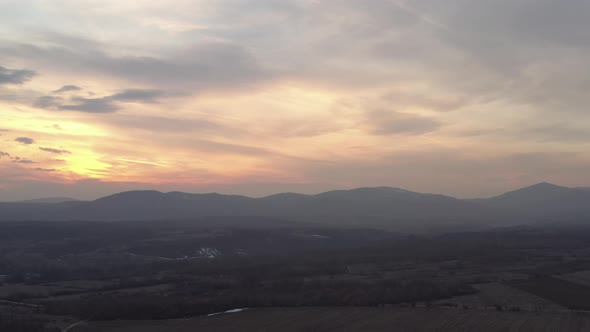 Colorful sky above  mountains Stol and Deli Jovan 4K drone video alt