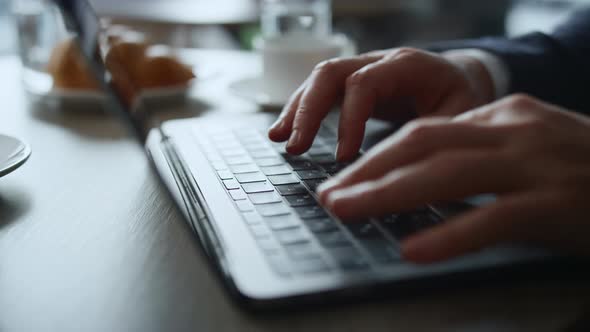 Businessman Hands Working Laptop Typing Computer Keyboard in Cafe Coworking alt