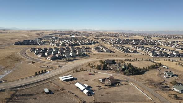 Aerial view of residential neighborhood in suburbia in snowless Winter alt