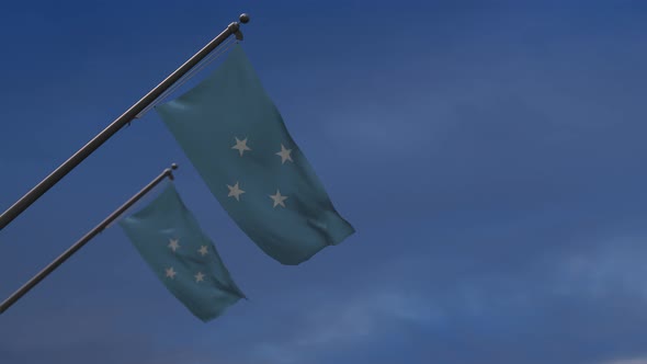 Federated States Of Micronesia Flags In The Blue Sky - 4K
