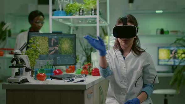 Scientist Woman Researcher Wearing Virtual Reality Headset alt