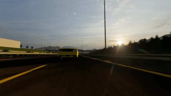 Yellow Luxury Sports Car Speeding On Highway alt