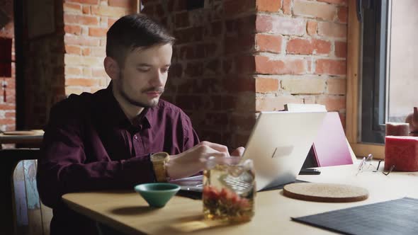 Male Book Writer Work in Cafe alt