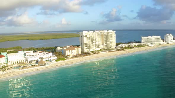 Aerial View of Cancun Mexico Showing Luxury Resorts and Blue Turquoise Beach alt