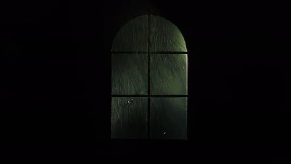 Window with raindrops and lightning. alt