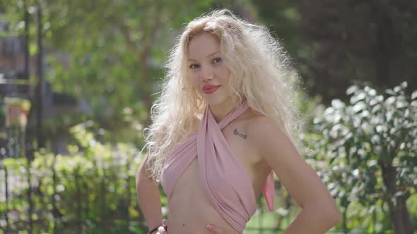 Close-up portrait of nice-looking multi-race, beautiful, sexy, young woman looking into camera alt