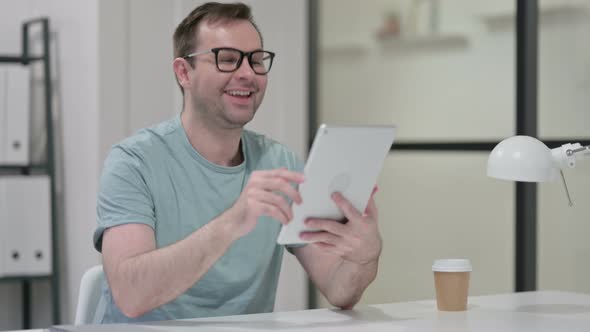 Video Chat Tablet By Young Man Work alt