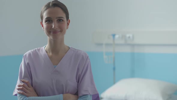 Professional young nurse smiling and posing at the hospital