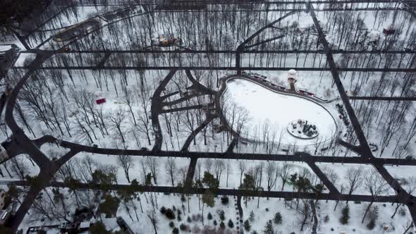 Frozen winter lake in city park, aerial Kharkiv