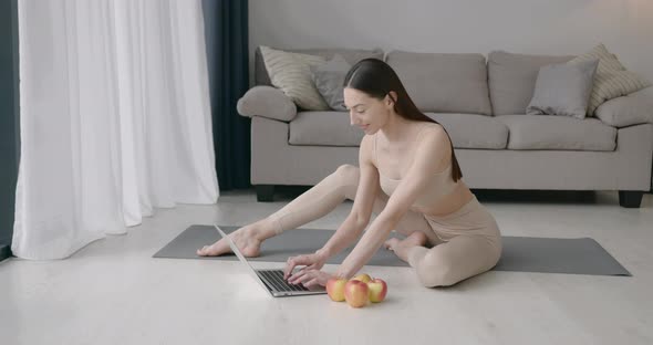 Fir Young Woman Doing Stretching Exercises at Home alt