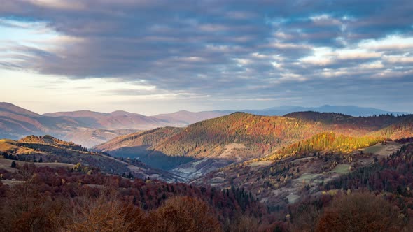 Sunrise Illuminates Forestry Mountains in Highland in Autumn alt
