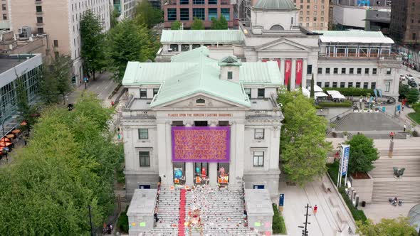 Cinematic Drone Reveal of the Cancel Canada Day Protest at the Vancouver Art Gallery in UHD. Rising alt