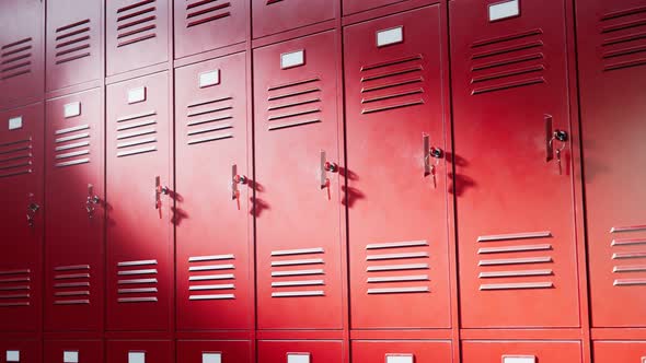 Lockers for students at school or university. Red lockers at hallway or gym. alt