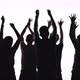Silhouettes of People Stand with Their Backs To the Camera and Applaud - VideoHive Item for Sale