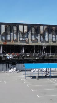 Vertical Video of a Destroyed Building of a Shopping Center in Bucha Ukraine alt