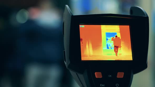 Screen of a Thermal Camera While Scanning Passers-by alt