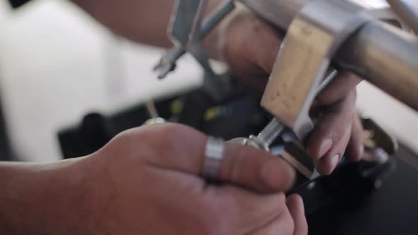 Work the Installer Sets the Mount for Light Devices on Stage alt