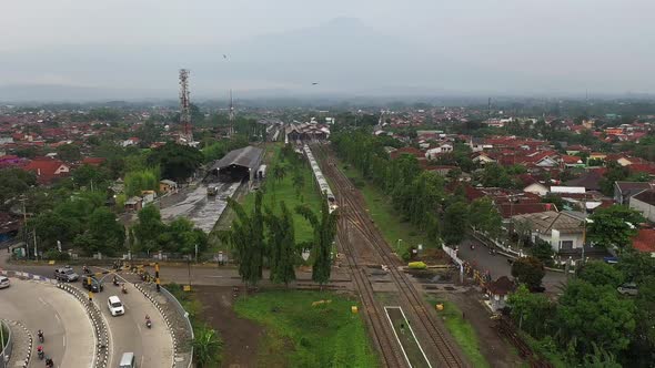 Aerial view of train departing from purwokerto station, central java, Indonesia