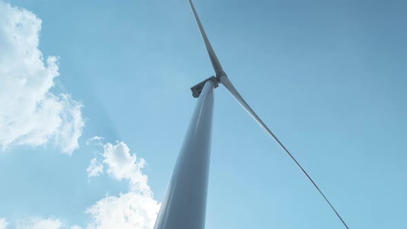 Wind Turbine Against the Sky in Motion