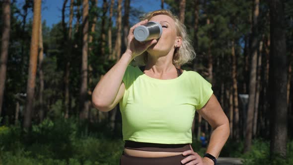 Mature Woman Walks on Pathway and Enjoys Life Closeup alt