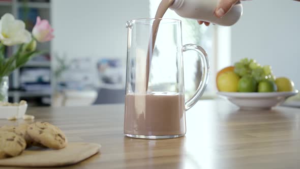 Pouring Chocolate Milk In To Jug