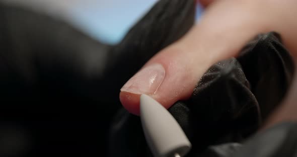 Cropped Manicure Procedure in Slow Motion at the Beauty Salon Nail Filing and Cuticle Trimming