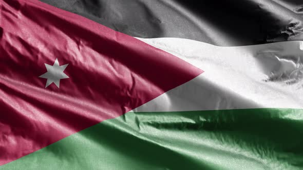 Jordan textile flag waving on the wind. Slow motion. 20 seconds loop.  alt