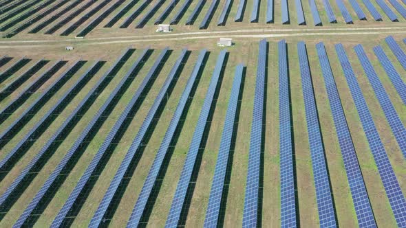 Fly Over Many Panels of Solar Cells alt