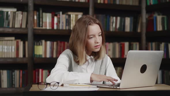 Happy Girl School Pupil Distance Learning Studying Online at Virtual Class with Teacher Tutor By alt