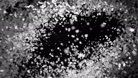 Super Slow Motion Shot of Salt Explosion on Black Background at 1000Fps alt