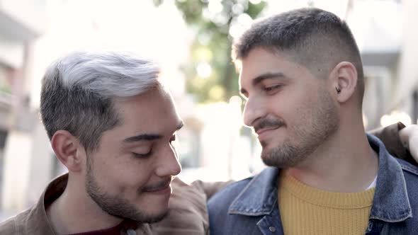 Lgbt Gay Male Couple Having Tender Moment Hugging Outdoor in the City alt