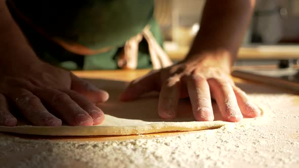 Master Chef of Italian Food Restaurant Form Pizza Dough By Kneading It in Flour