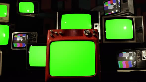 Stack of Old TV turning on Color Bars and Green Screen. 4K Version. alt