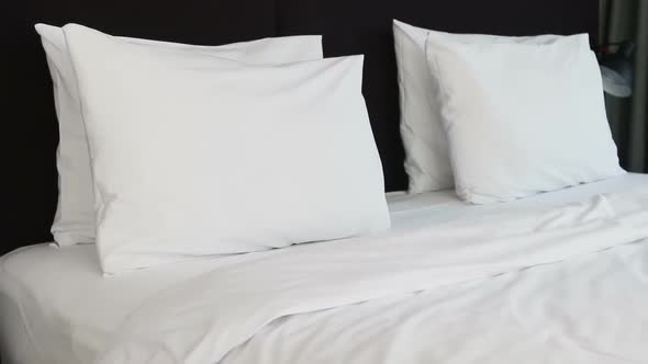 Large Bed with Pillows in the Hotel or at Home
