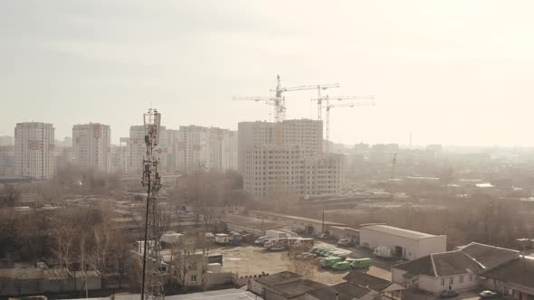 Approaching Aerial Shot of the City Landscape and the Construction of New Buildings for Office and alt