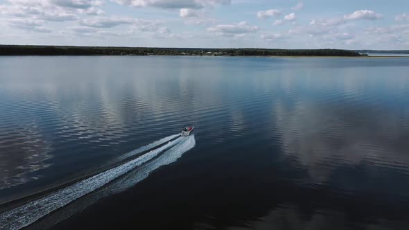 Speedboat Quickly Floats on the Water Surface