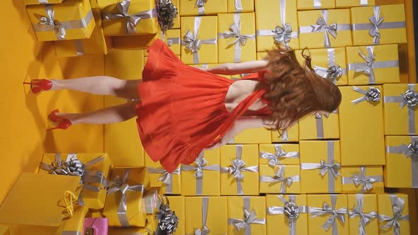 Cute Redhaired Woman is Impressed By the Blowing Air Wind of the Dress an Emotional Woman is Happy alt