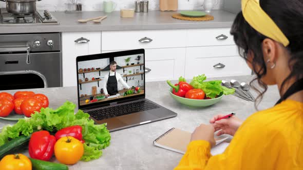 Man Chef Food Blogger in Laptop Computer Screen Tells Teaches Student Housewife alt