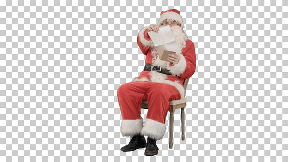 Santa Claus sitting on chair with letters in hands, Alpha Channel