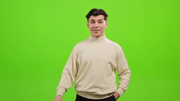 The Man is Standing and Looking at the Camera alt