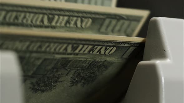 Calculating Machine for Money Counting American Hundred Dollar Banknotes Closeup alt