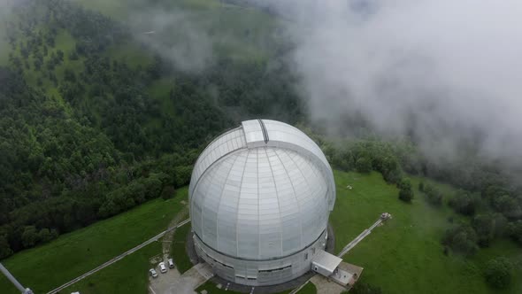 Aerial view of Astrophysical observatory, BTA tower.  Static camera. Astronomy Nizhny Arkhyz, Russia