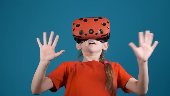 Girl with Modern Virtual Reality Goggles Scared By VR Scene alt