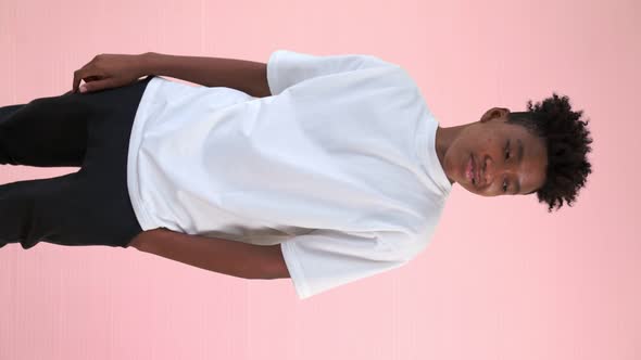 Vertical Video of Young African American Teenager Portrait Middle Shot alt