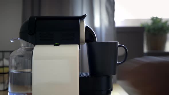 Making a Cup of Coffee with a Coffee Machine