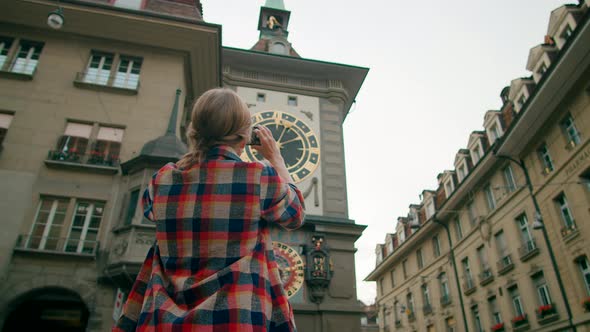 Traveling Lady Takes Picture By Phone of Bern Landmark Clock Tower Switzerland