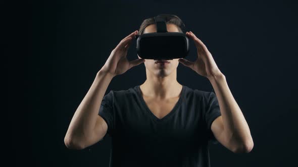 Closeup Shot of Man Getting Experience in Using VRheadset